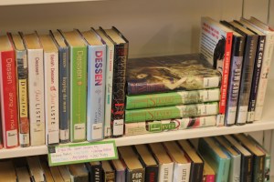 breaking up books on shelves | wrapped up in books